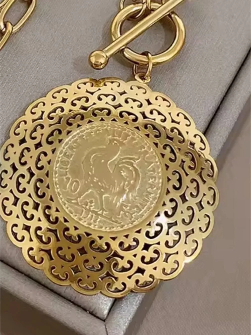 Gold tone Rooster carved Medallion Necklace